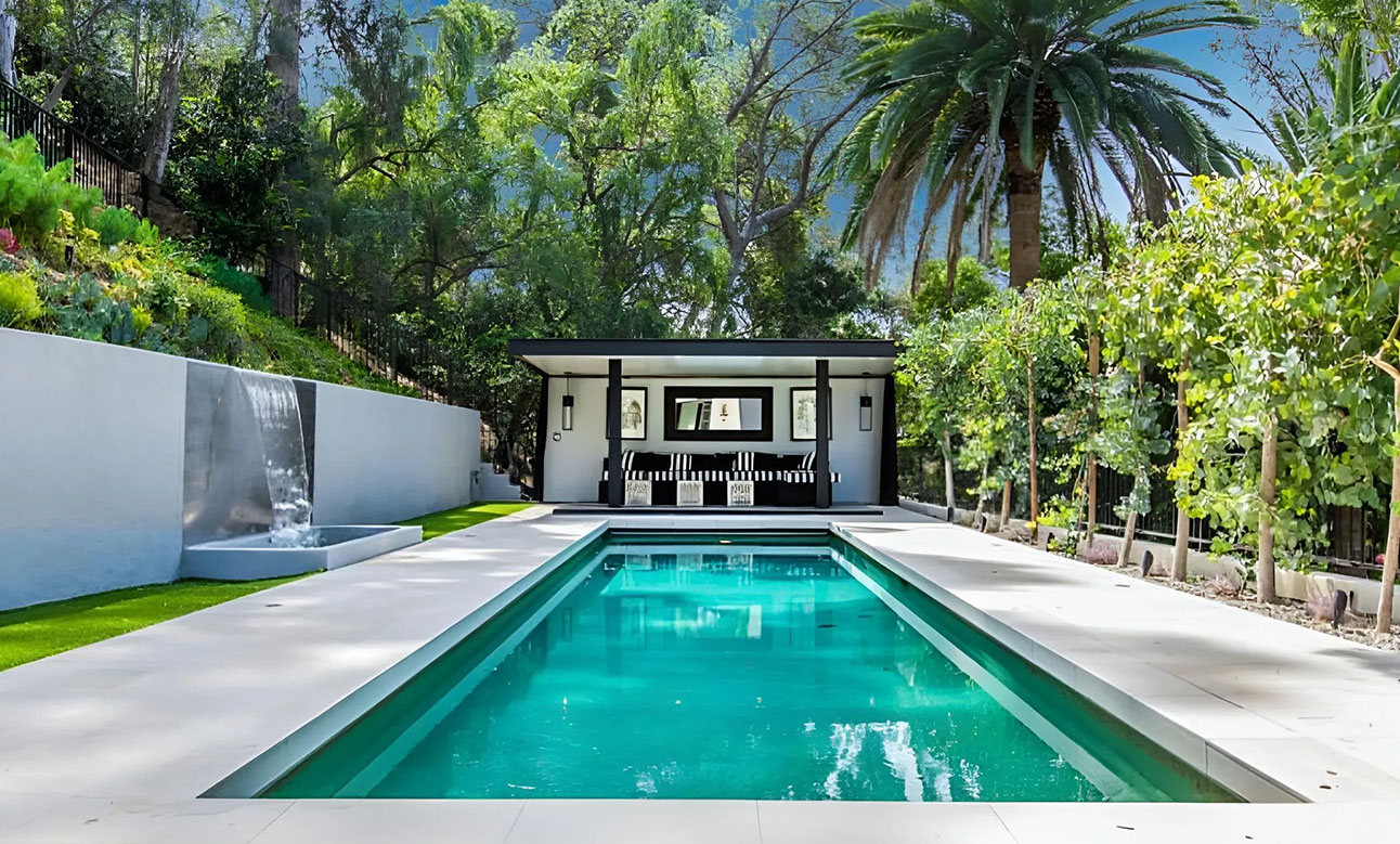 A swimming pool with water falls