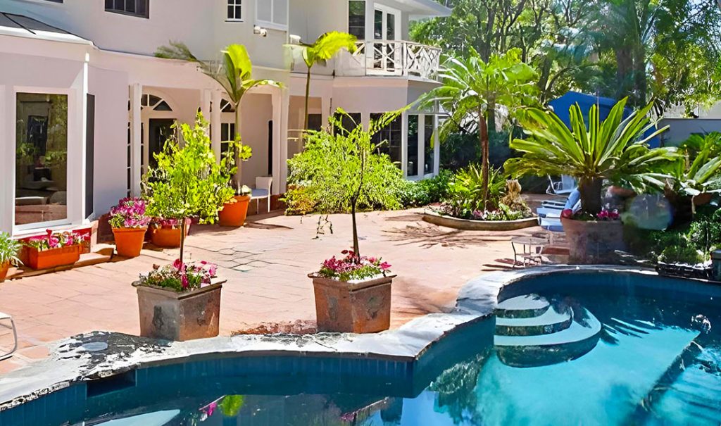 Faith Recovery Center pool area with trees