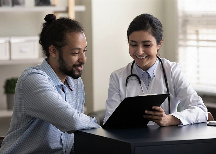 Doctor talking to his patient about the result